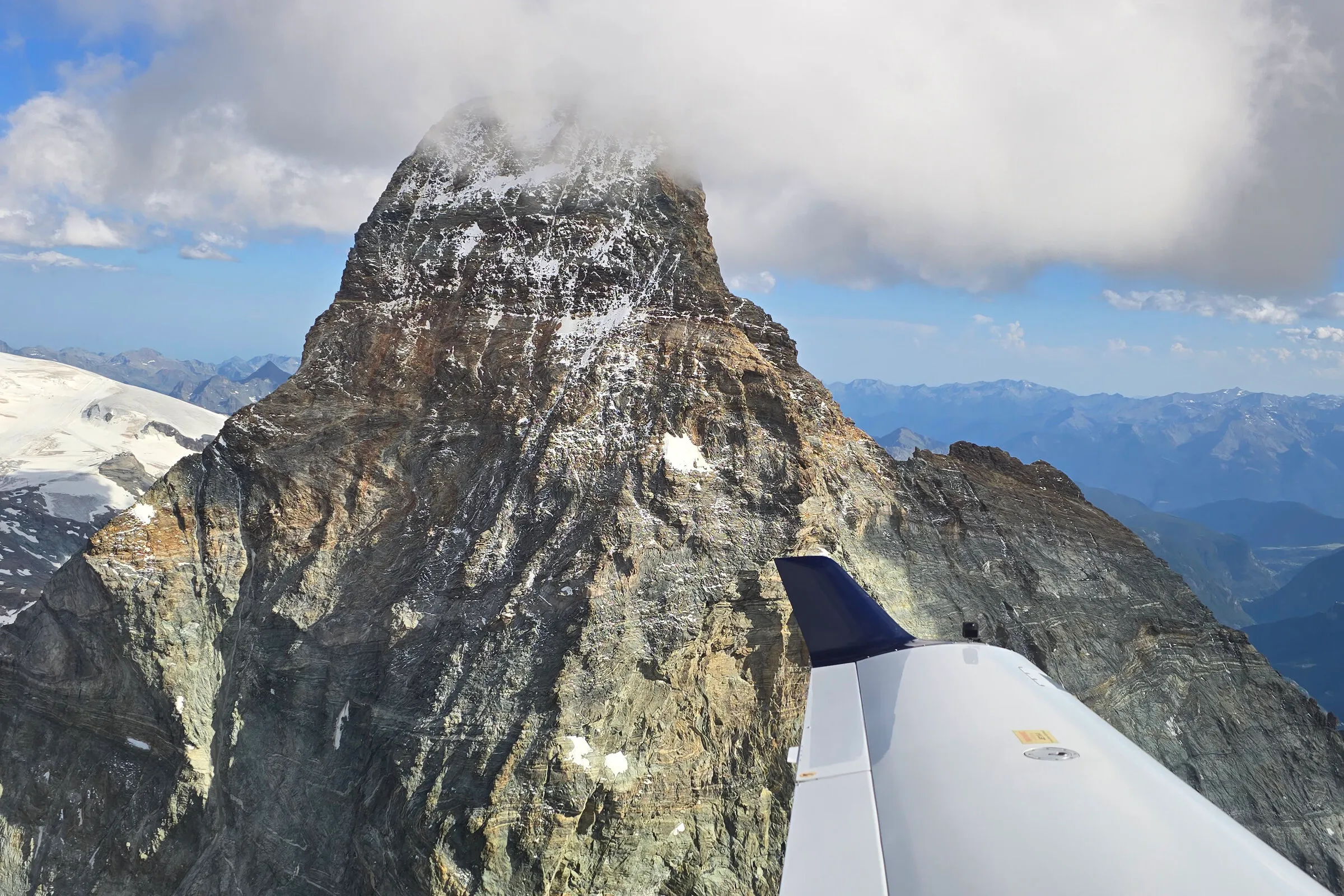 Diamond DA40 wingtip alongside the Matterhorn peak